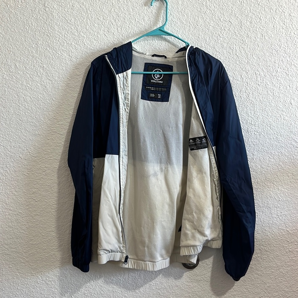 Blue and white wind breaker